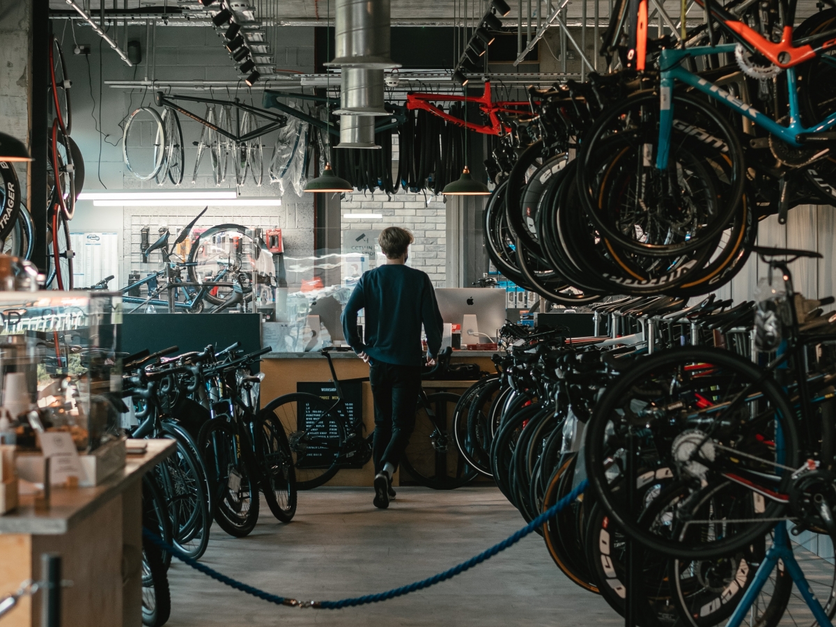 Small Business Man walking in bike store